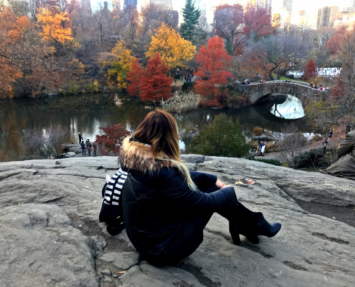 Woman in central park during FAll